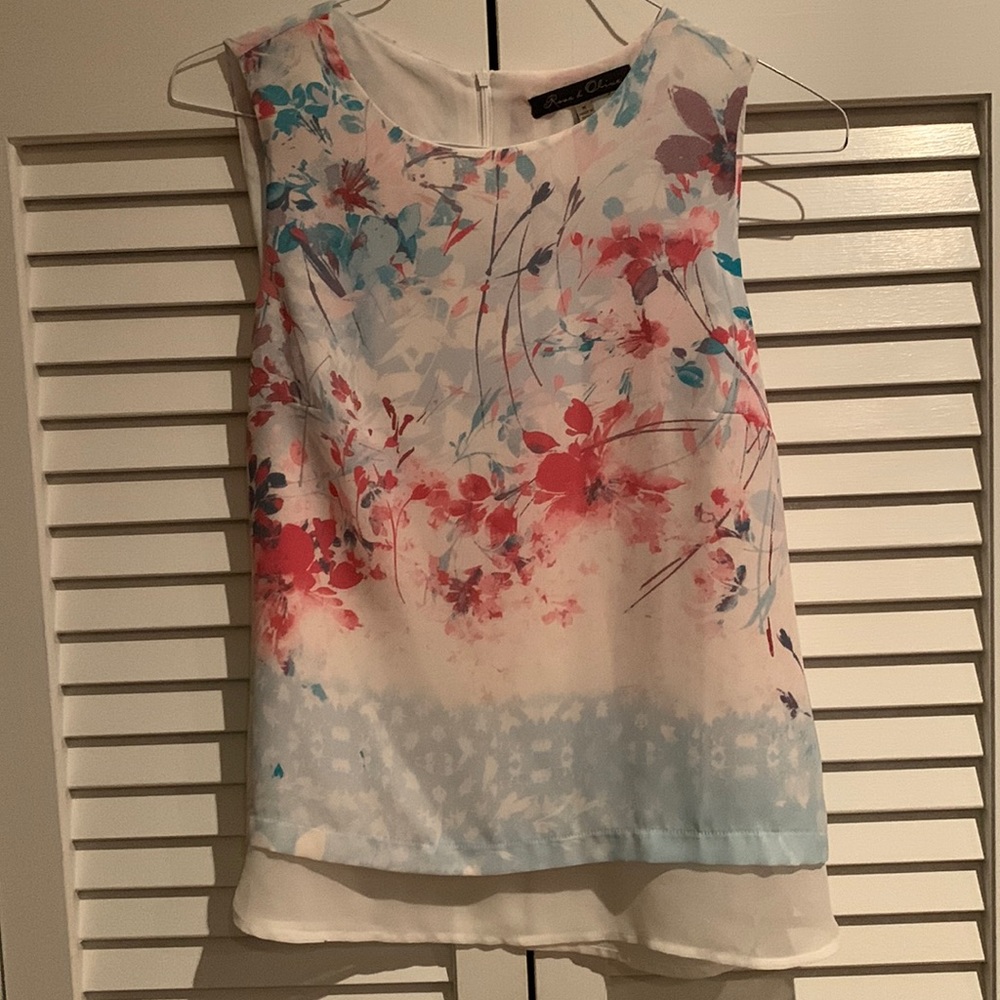 Soft feminine sleeveless blouse